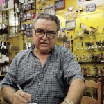Miniature shop owner, Mexico City, Nikon F100